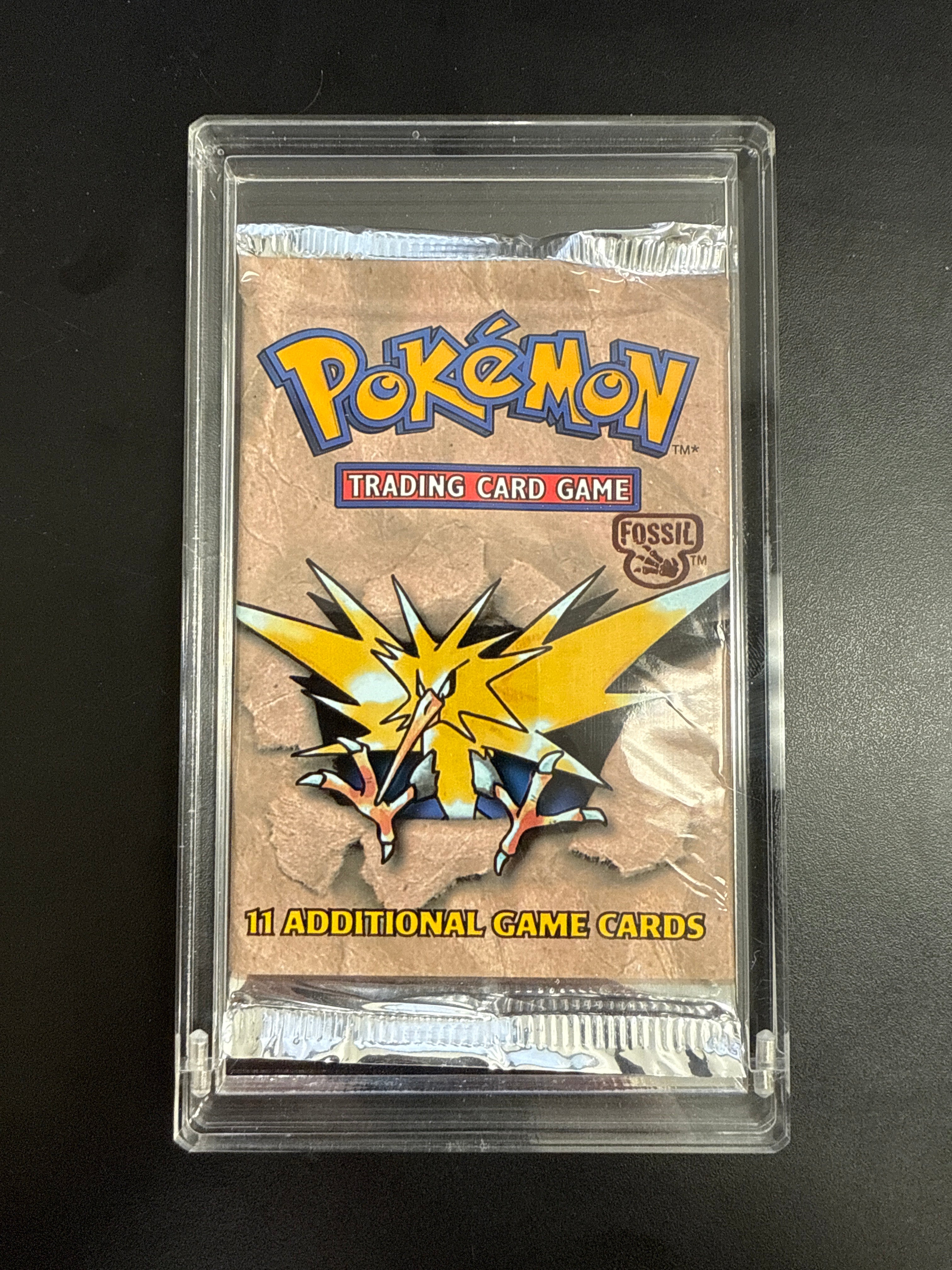 fossil booster pack pokemon Pokémon Trading Card Game Fossil Booster Pack, 11 Additional Game Cards :  Buy Online at Best Price in KSA main image 0