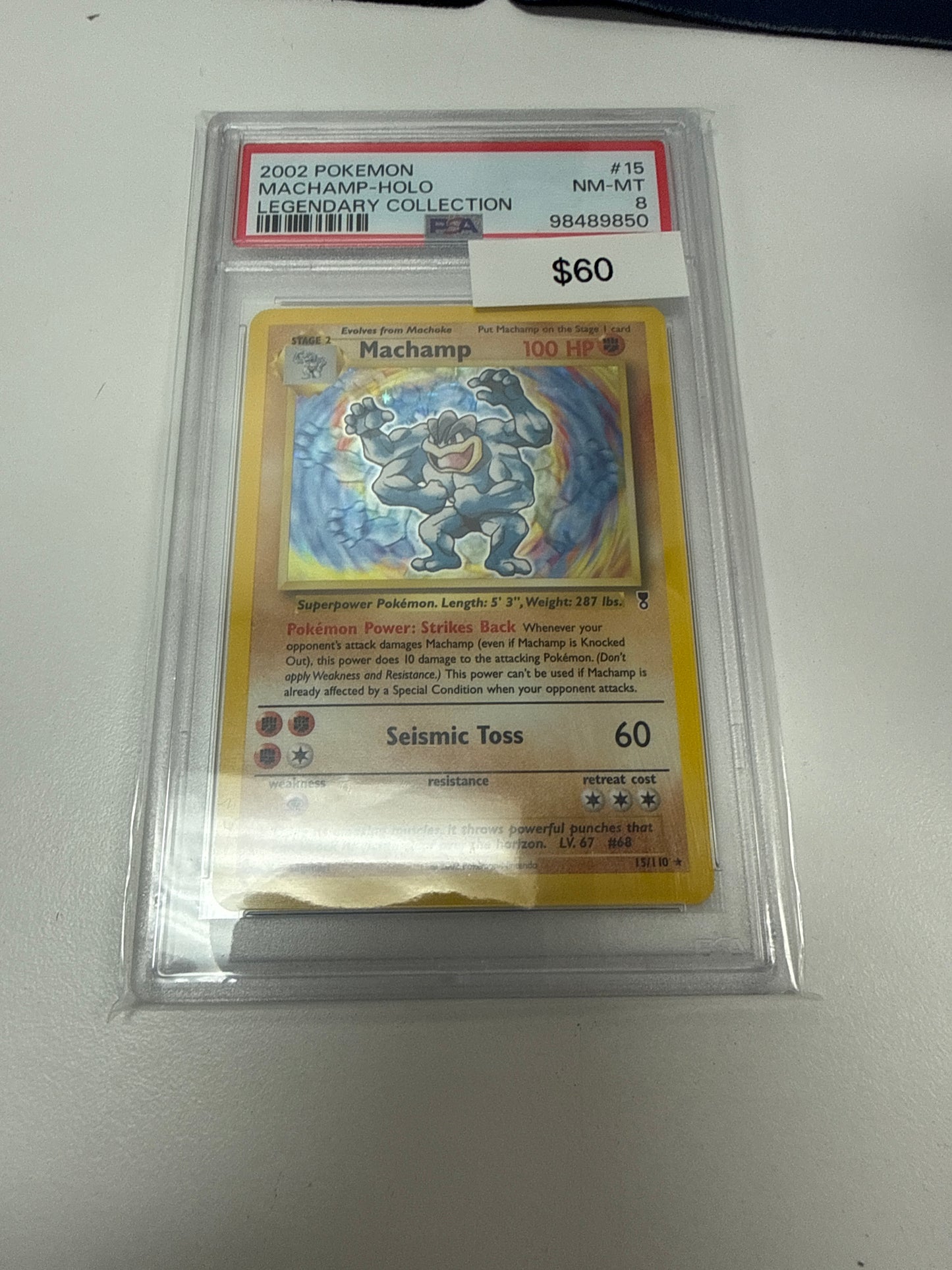Pokemon Machamp Holo #15/110 PSA 8