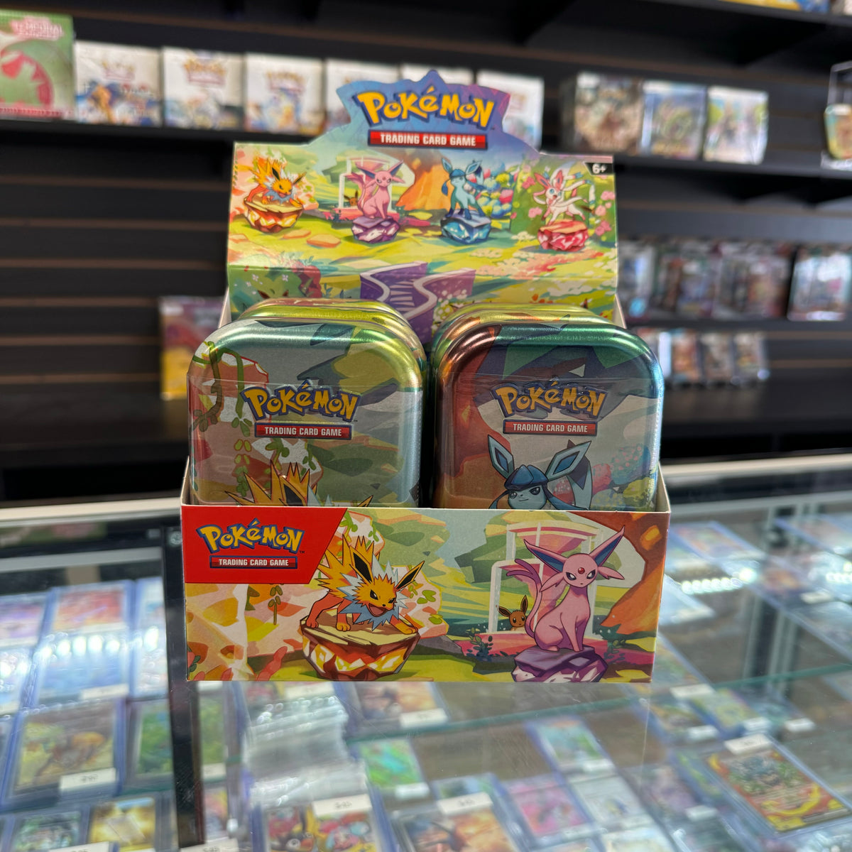 pokemon trading card game prismatic evolutions mini tin Pokémon Prismatic Evolutions Mini Tin – Grail Collectibles AZ