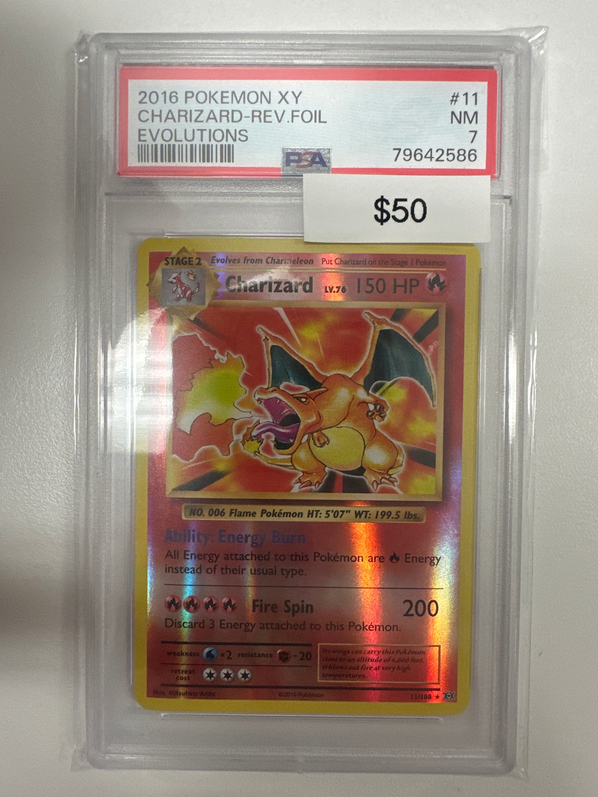Pokemon XY Evolutions Charizard Reverse Holo PSA 7