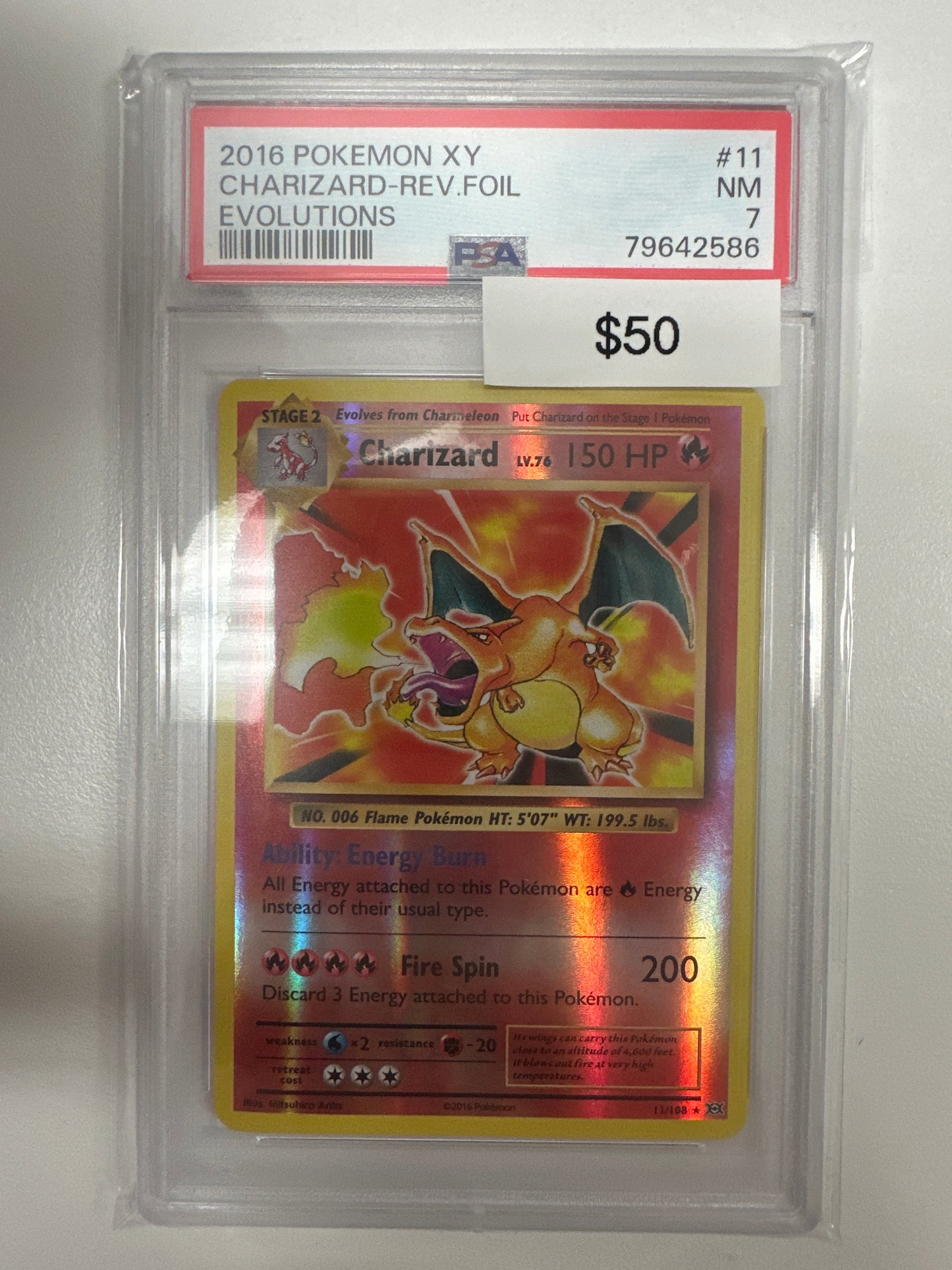 Pokemon XY Evolutions Charizard Reverse Holo PSA 7