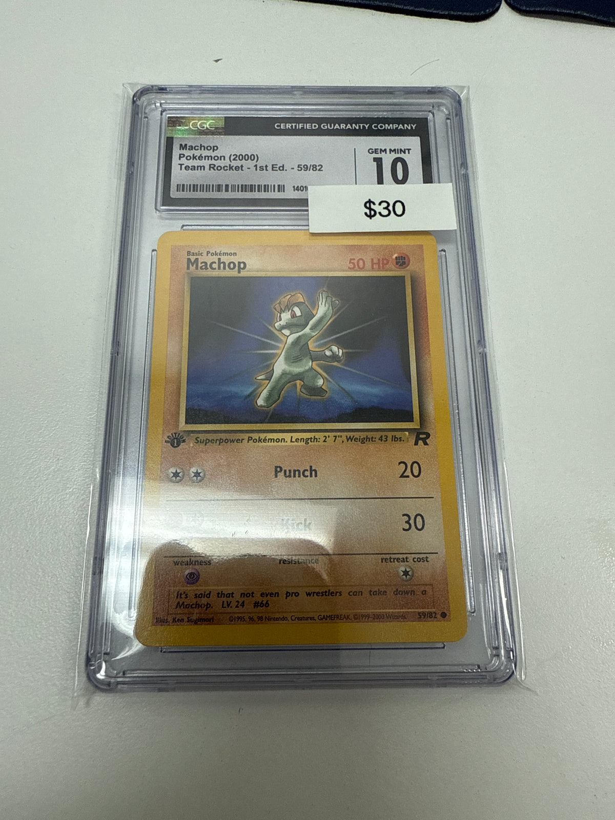 Team Rocket 1st Ed Machop #59/82 CGC 10