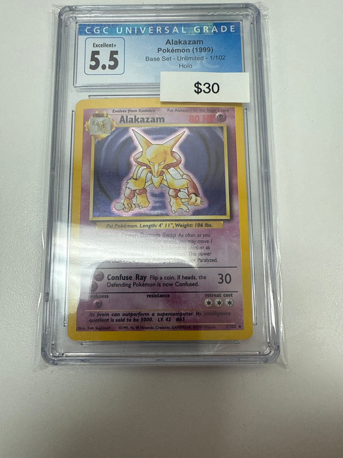 Base Set Alakazam Holo #1/102 CGC 5.5