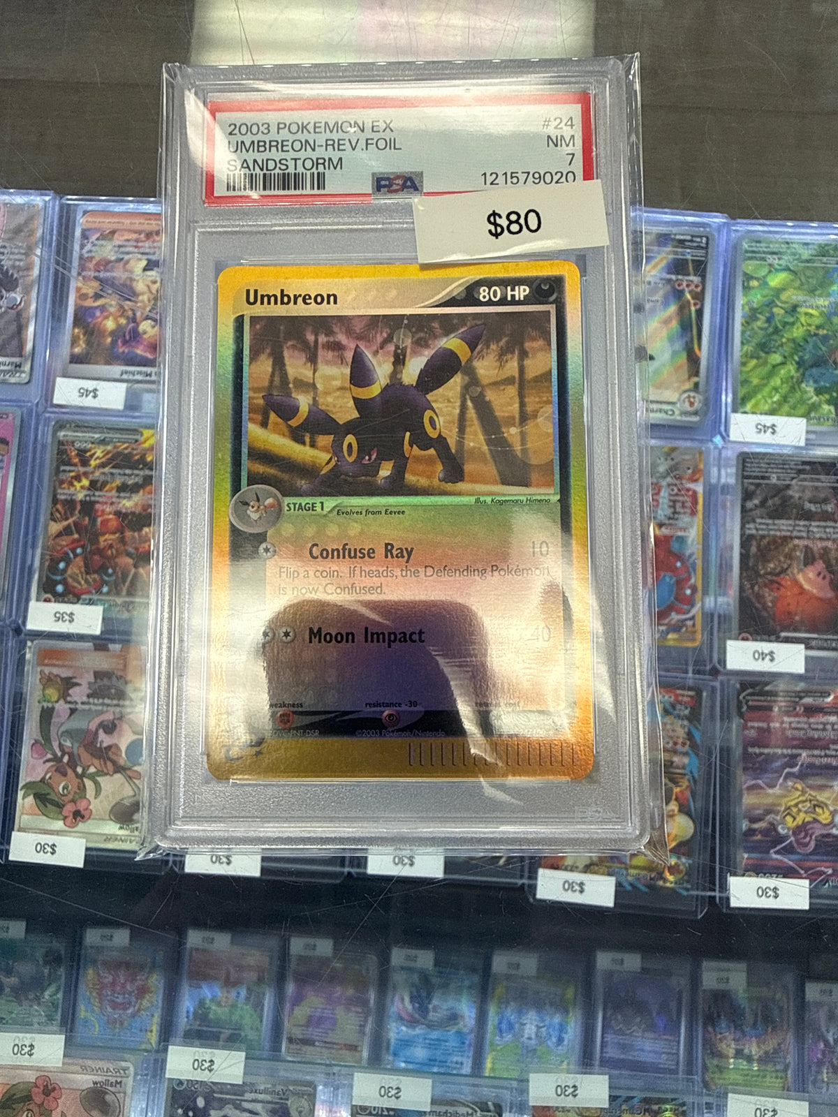 Pokemon Umbreon Rev Holo #24/100 PSA 7