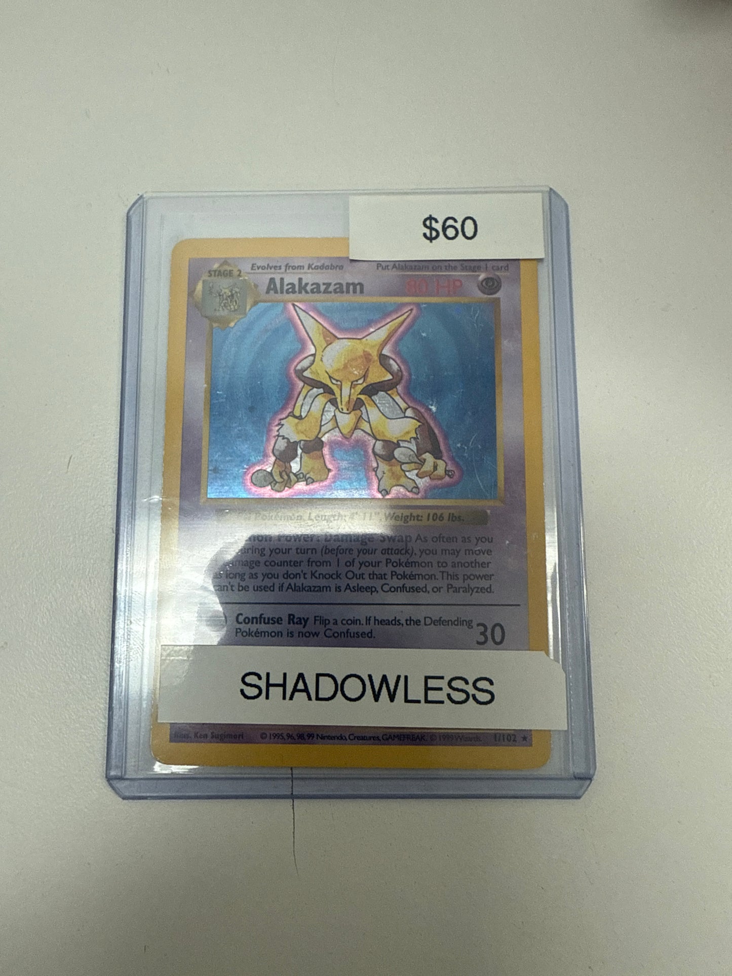 Base Set Shadowless Alakazam Holo #1/102