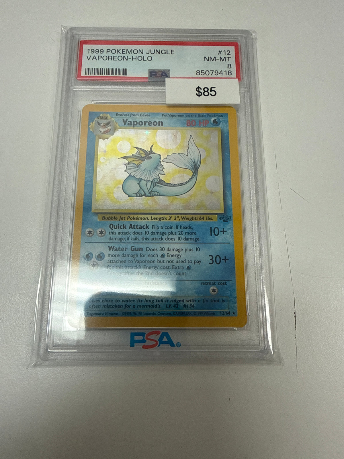 Pokemon Vaporeon Holo #12/64 PSA 8