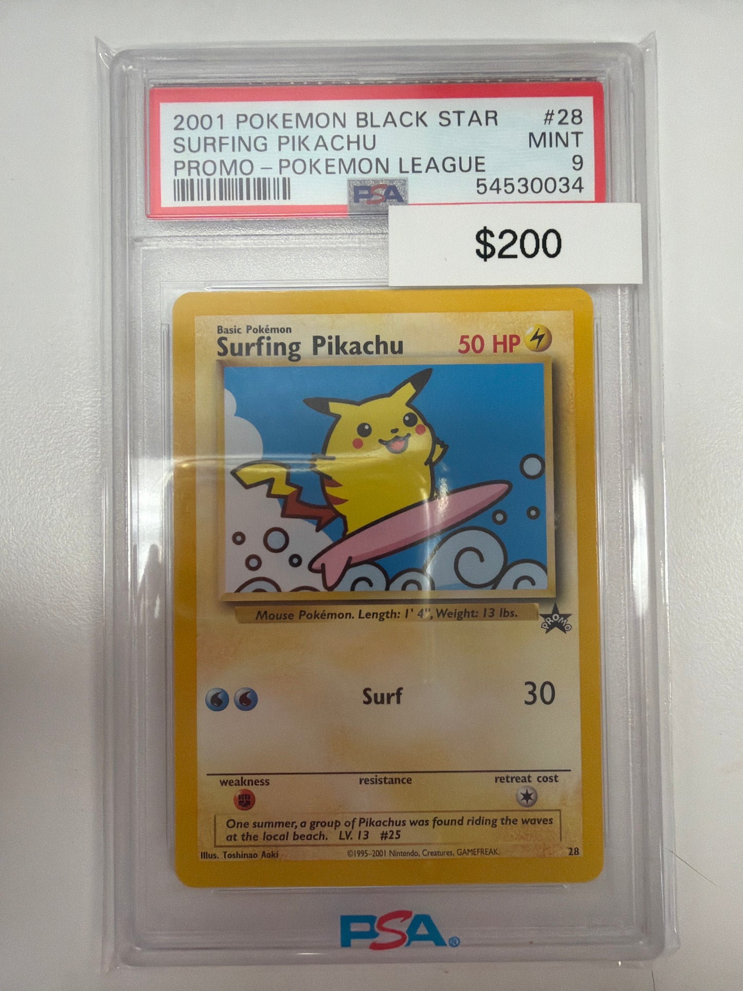 Pokemon Surfing Pikachu 28 PSA 9