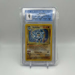 1999 Pokemon Base Set 1st Edition Machamp #8/102 Holo CGC 9 MINT